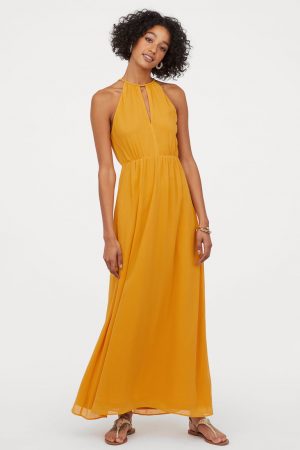 Los vestidos amarillos de Primark, H&M, Bershka y más tiendas que están desapareciendo de sus perchas 3 Merca2.es Vestido amarillo largo