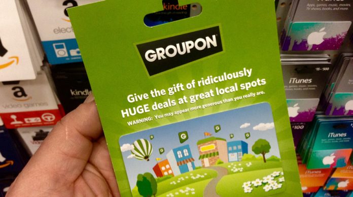 Groupon presagia la crisis con sus cupones descuento