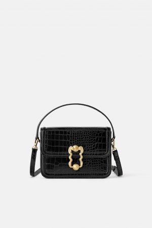Zara: los bolsos de fiesta que acompañarán a tus mejores looks 8 Merca2.es Bandolera riñonera con estampado animal de Zara