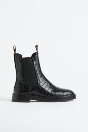 Estas botas de H&M cuestan 34,99 euros y sirven para todo 1 Merca2.es hym 1 1 Merca2.es