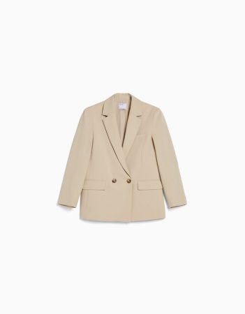 Blazer tailoring cruzada regular fit corte femenino de 1 botón y bolsillos