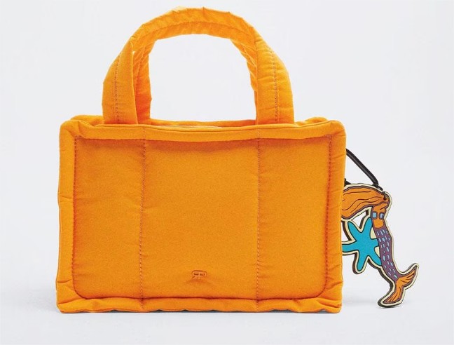 bolso mano acolchado naranja parfois