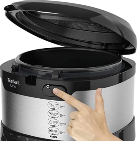 Ajuste de temperatura y bandeja recolectora de grasa en la cocina