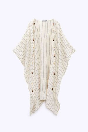 Los caftanes son un 'must' este verano: aquí tienes algunos de Zara a grandes precios 3 Merca2.es caftan con abalorios de zara dc7364fa 230627093416 864x1296 Merca2.es