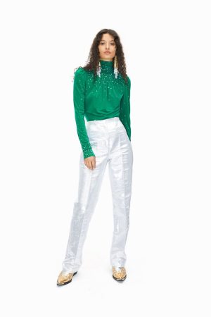 Brilla con estilo en las fiestas con el pantalón de vestir metalizado brillante de Rabanne H&M