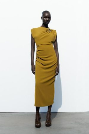VESTIDO MIDI APLIQUE DORADO