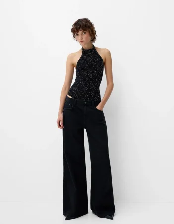 Haz que tu Navidad sea aún más brillante con esta cazadora metálica de Bershka 7 Merca2.es Body strass