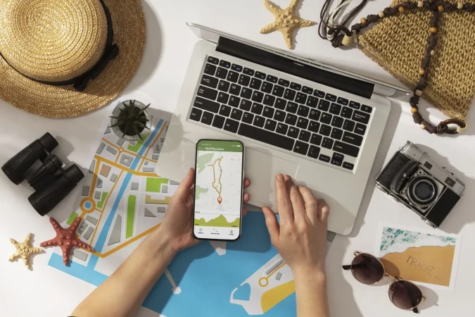 top view hand holding smartphone Merca2.es