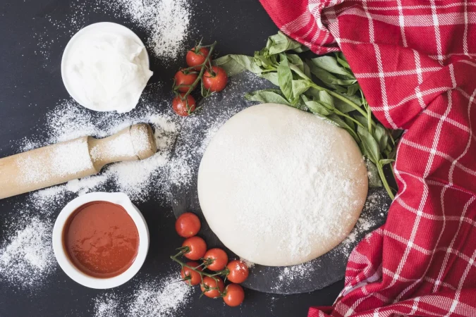 Cómo hacer la masa de pizza al estilo de la Nonna: Un viaje a la auténtica cocina italiana 1 Merca2.es masa de pizza