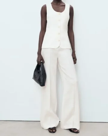 Accesorios que funcionan con un mono blanco