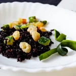 Aprende a hacer un verdaderamente sabroso arroz negro como en la mejor playa valenciana
